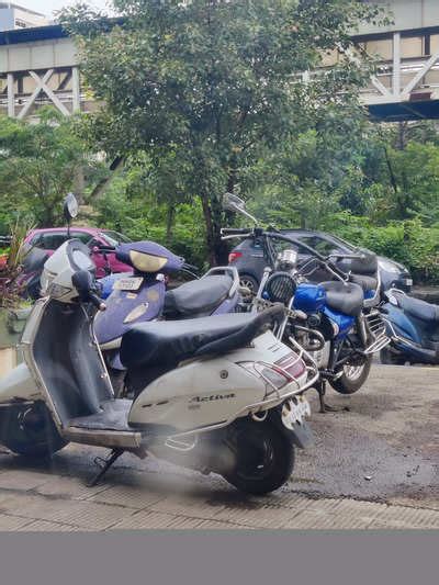 illegal parking on foothpath - Times of India