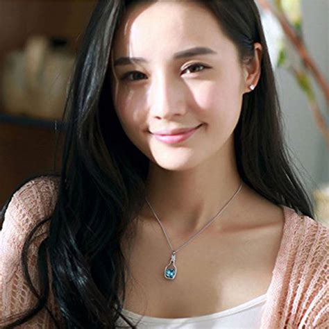 Send Oviya Blue Rhodium Plated Solitaire Crystal Brass Heart Bottle ...