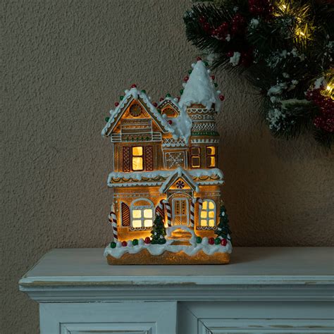 Glitzhome® 12" Light-Up Gingerbread House Table Décor | Michaels in ...