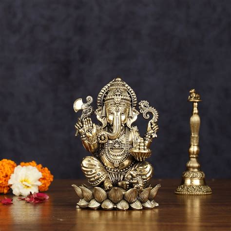 Brass Superfine Intricately Carved Small Right trunk Ganesha Idol - 5 ...