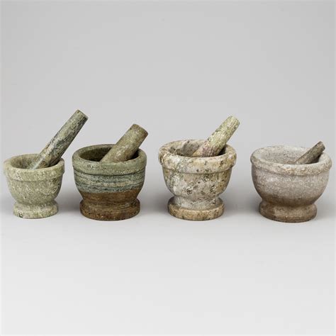 Four Swedish green marble mortars and pestles, early 20th century ...