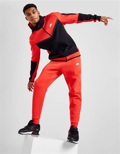 red nike tech tracksuit