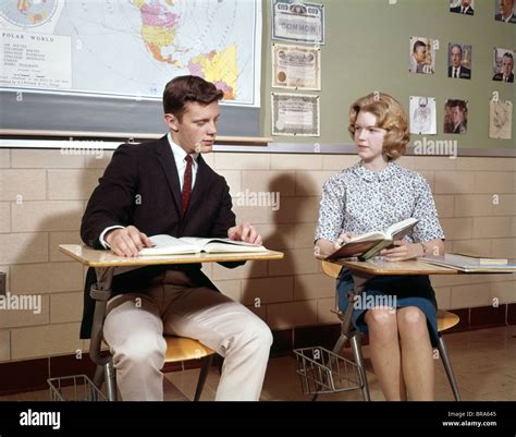 1960s TEENAGE BOY GIRL SEATED CLASSROOM DESKS TALKING STUDYING RETRO ...