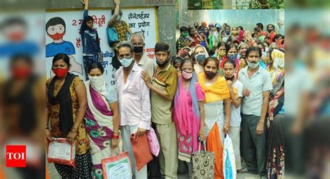 Hunger crisis forces even middle-class Indians to line up for rations ...