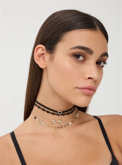 Var zlatne Pakiranje od 4 Choker ogrlica sa srcima i mašnom | Terranova