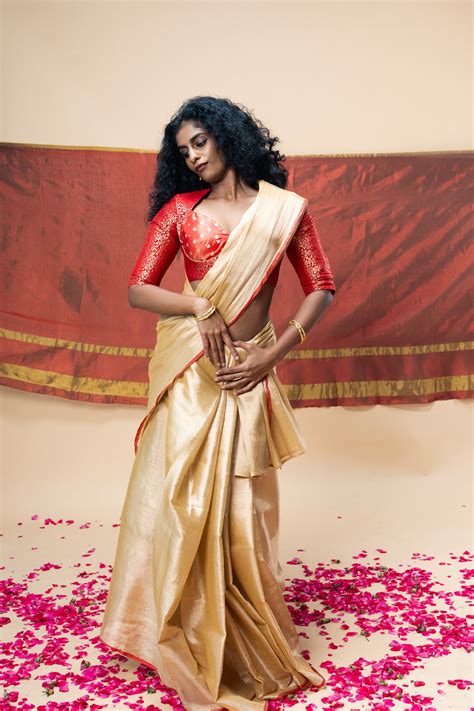 Buy MRIGVI I Rose Gold Handloom Tissue Saree With Red Border | Huts and ...