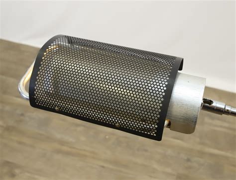 George Nelson | Floor lamp with a perforated shade | MutualArt