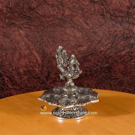 Antique Peacock Diya - Crazy Silver Shine