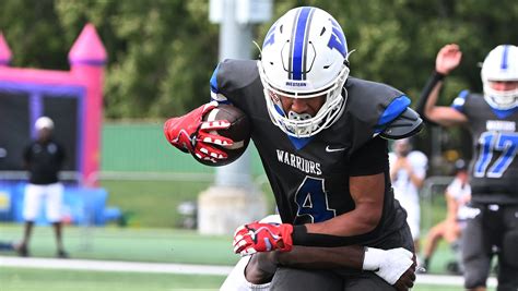 Walled Lake Western dominates South Lyon, 49-7