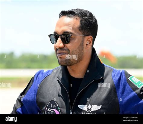 Ali AlQuarni from Saudi Arabia smiles for family members and media after arriving at the Landing ...
