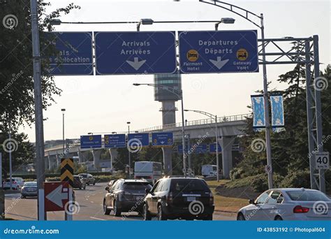 Arrivals and Departures Road Sign in YVR Airport Editorial Photography ...