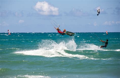 Kitesurfer launching into the air