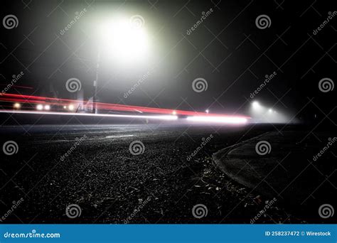 Long Exposure Shot of the Street Lights at Night on the Road Stock ...