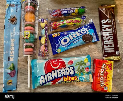 assorted American candy including oreo hersheys airheads cotton candy ...