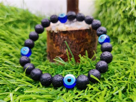 Black Lava Stone and Evil Eye Bracelet — Parthpooja