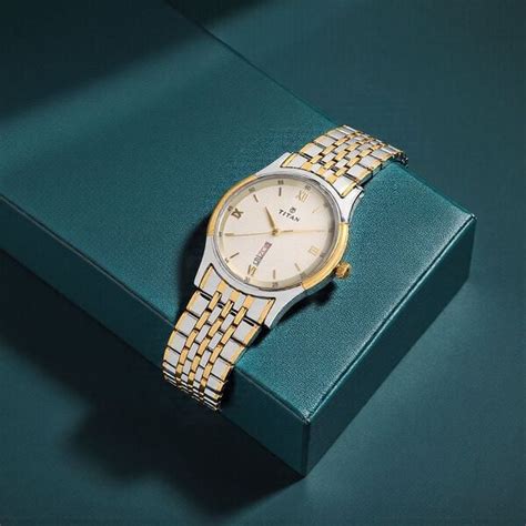 Buy Online Titan Analog with Day and Date Off White Dial Stainless ...
