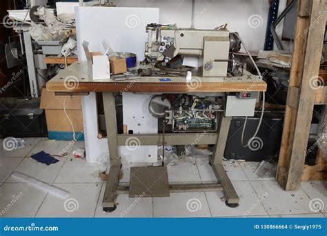 Old Sewing Machine in the Repair Shop Stock Photo - Image of production ...