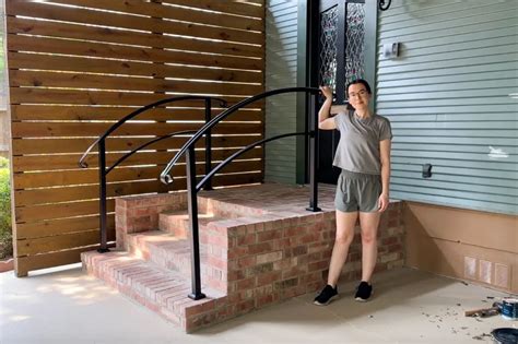 How to Install Iron Railings on Brick or Concrete Steps - Renee Renovates