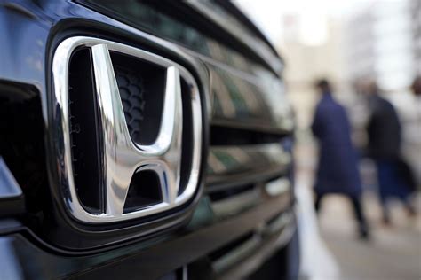 Japanese automaker Honda reports its 3Q profit jumped on strong demand ...