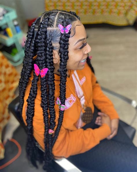 Butterfly Knotless Braids and so many more trends here at Queen Tingz ...