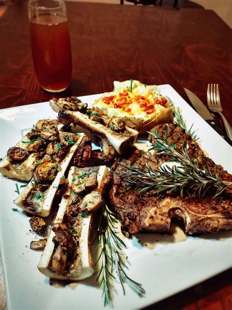 [OC] T-bone, marrow bones and twice baked potatoe... Topped with Bella ...