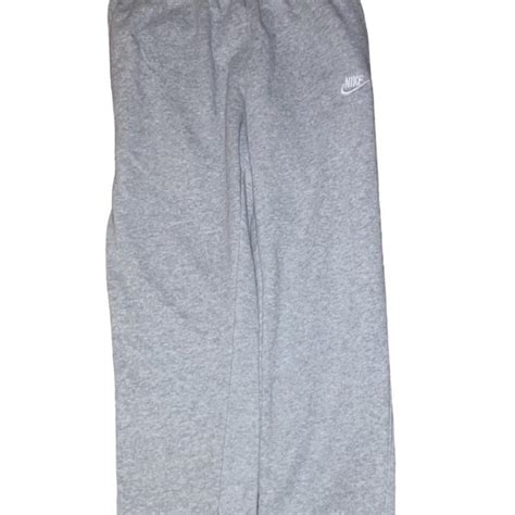 Grey nike uncuffed baggy joggers Tagged as medium... - Depop