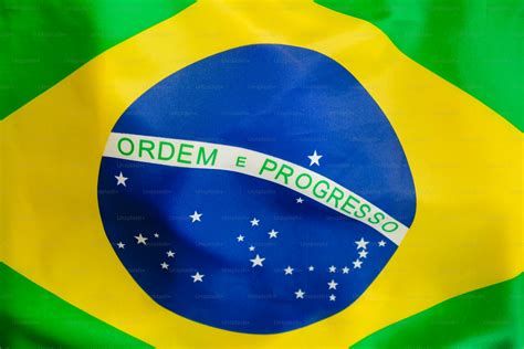 A close up of a flag with the word ordem e progress on it photo – Brazilian flag Image on Unsplash