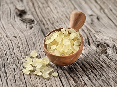 Premium Photo | Mastic tears of chios island on wooden background