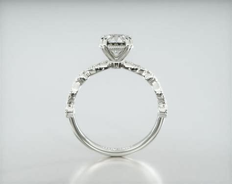 Round & Marquise Shape Diamond Engagement Ring Embellished With a ...