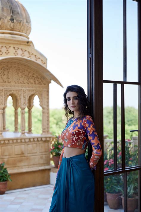 Teal satin drape skirt with burnt orange handblock highlighted blouse ...