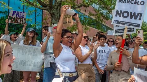 Supporters of Marcelo Gomes da Silva rally at Lowell Immigration Court