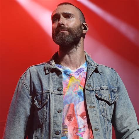 See Adam Levine React After Fan Jumps Onstage During Maroon 5 Concert