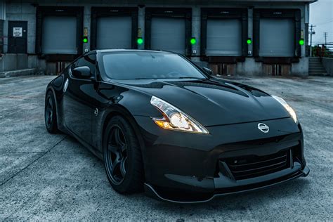 Download Nissan 370z Black Sports Cars Wallpaper | Wallpapers.com