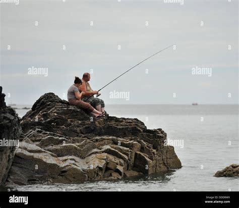 Sea fishing angling beach rod hi-res stock photography and images - Alamy