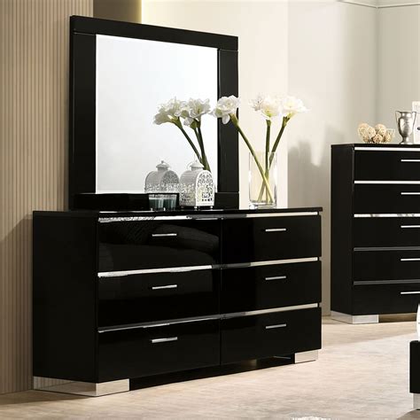 Strikingly contrasting, this contemporary dresser and mirror combo ...