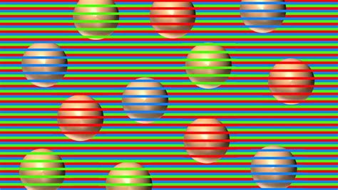 A color contrast optical illusion makes it look like the balls are ...