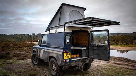 The classic Land Rover Defender 90 becomes a high-roof "camper"