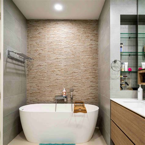 Stone And Grey Wall Tiles Design For Bathroom | Livspace