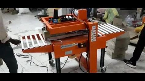 Taping and Erector Machine - FULLY-AUTOMATIC SIDE BELT CASE SEALER ...