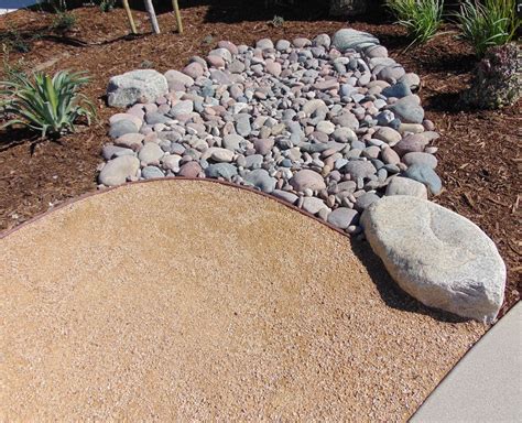 California Gold D. G. installed with a 3/4" gravel, White Granite ...