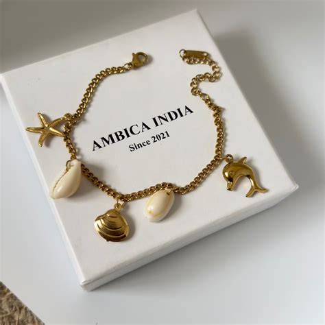 Sea shell charm bracelet – Ambica India