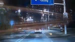 Lucky motorists escape death as building-sized drill topples onto busy road