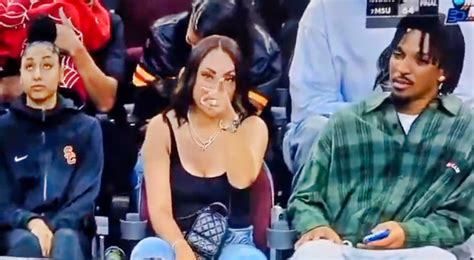 Jayden Daniels' Mom Sits Between Him And JuJu Watkins