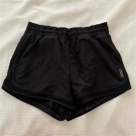 Lorna Jane black gym shorts with built in bike... - Depop