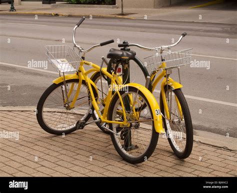 Yellow bikes. Bike share program, Lexington, Kentucky Stock Photo - Alamy