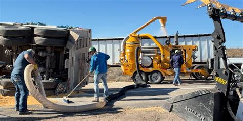 Driver hurt after 2 semis collide south of Garden City, spilling grain