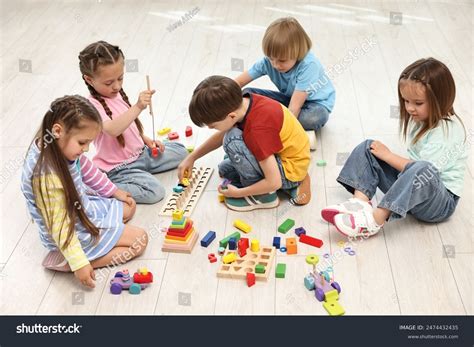 Group Children Playing Together On Floor Stock Photo 2474432435 ...