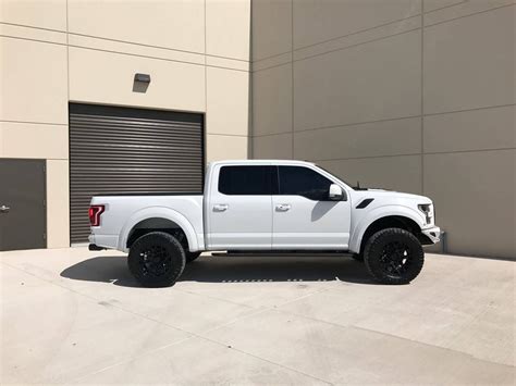 White Lifted Ford F-150 Boasts Contrasting Black Additions | Lifted ford, Ford trucks f150, Ford ...