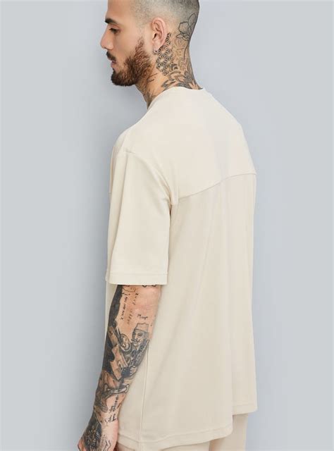 Buy Men Textured Oversized Sports T-shirt Online at just Rs. 599.0 ...