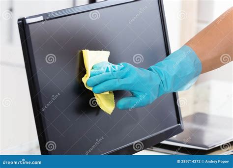 Close-up of a Janitor Cleaning Computer Screen Stock Photo - Image of ...